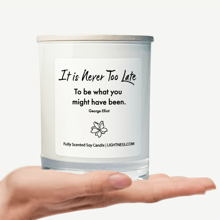 Candle in a white glass jar with Inspirational Quote displayed on a hand - Mindful design