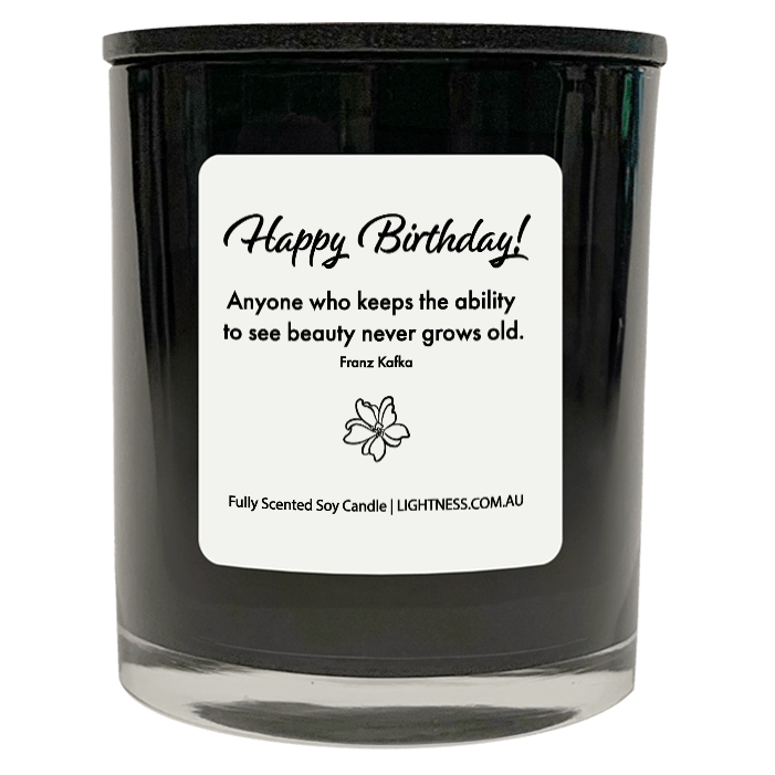 Candle in black glass jar with Birthday quote - Anyone who keeps the ability to see beauty never grows old.