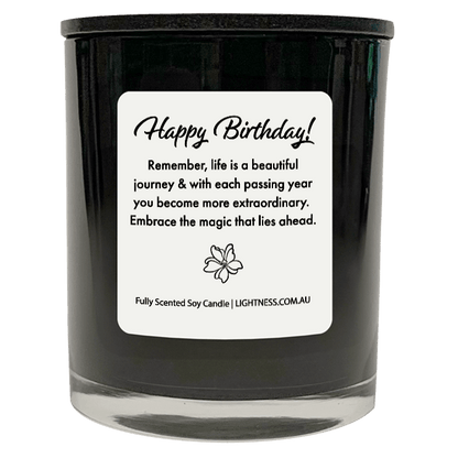 Candle in black glass jar with Birthday quote - Remember, life is a beautiful journey, and with each passing year, you become more extraordinary. Embrace the magic that lies ahead.