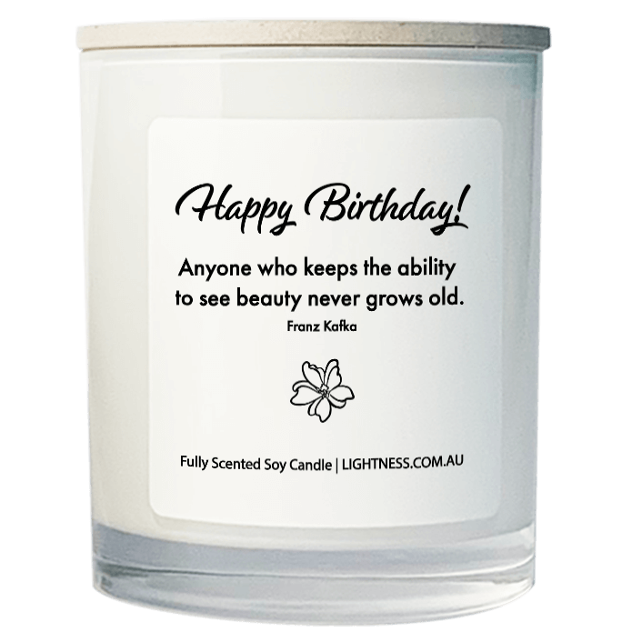 Candle in white glass jar with Birthday quote - Anyone who keeps the ability to see beauty never grows old.