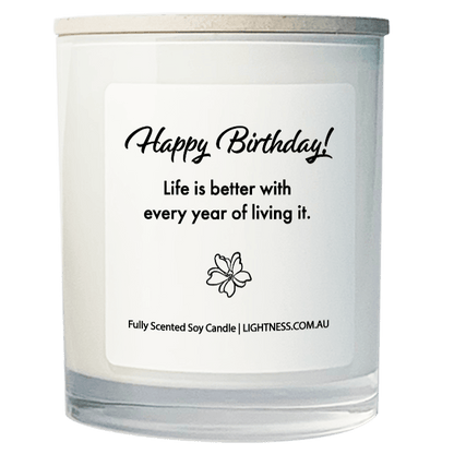 Candle in white glass jar with Birthday quote - Life is better with every year of living it.