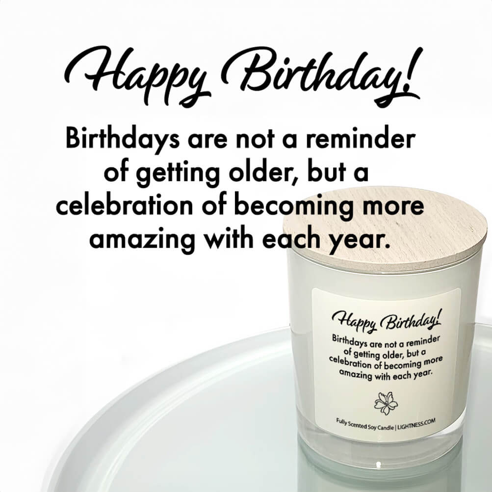 Candle in white glass jar reflected in mirror with Birthday quote - Birthdays are not a reminder of getting older, but a celebration of becoming more amazing with each year.