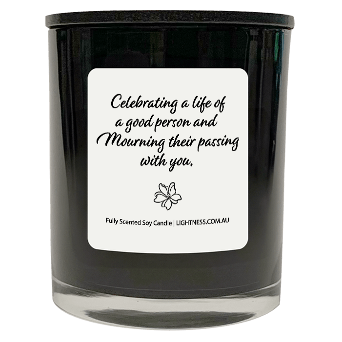 Candle in black glass jar with Condolence quote - Celebrating a life of a good person and mourning their passing with you.