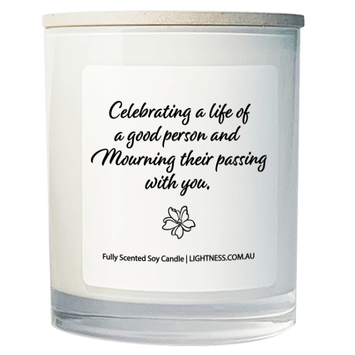 Candle in white glass jar with Condolence quote - Celebrating a life of a good person and mourning their passing with you.