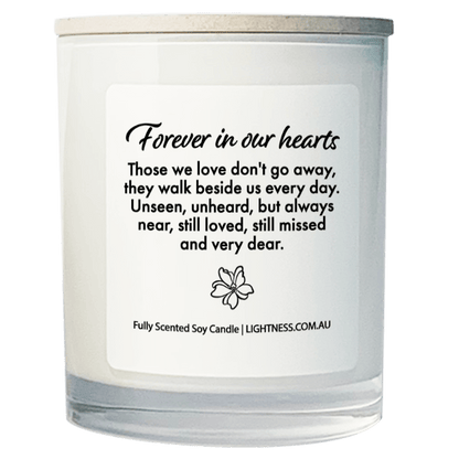 Candle in white glass jar with Condolence quote - Forever in our hearts. Those we love don't go away, they walk beside us every day. Unseen, unheard, but always near, still loved, still missed and very dear.