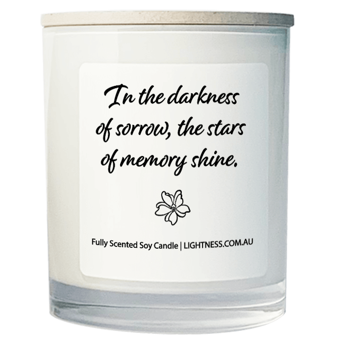 Candle in white glass jar with Condolence quote - In the darkness of sorrow, the stars of memory shine.