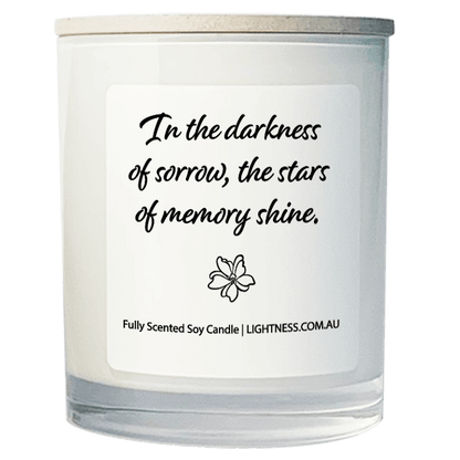 Candle in white glass jar with Condolence quote - In the darkness of sorrow, the stars of memory shine.