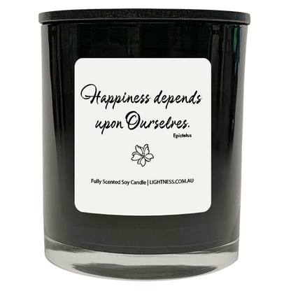 Candle in black glass jar with Happiness quote - Happiness depends upon ourselves.