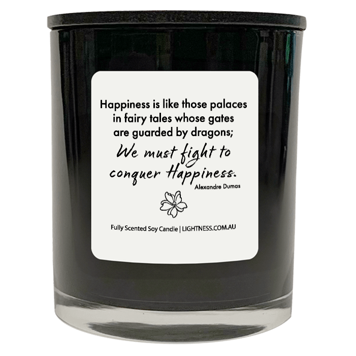 Candle in black glass jar with Happiness quote - Happiness is like those palaces in fairy tales whose gates are guarded by dragons; we must fight in order to conquer it.