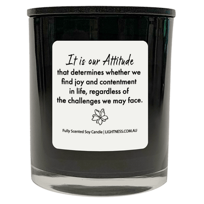 Candle in black glass jar with Happiness quote - It is our attitude that determines whether we find joy and contentment in life, regardless of the challenges we may face.