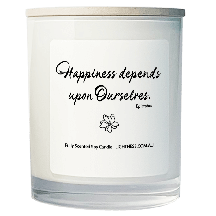 Candle in white glass jar with Happiness quote - Happiness depends upon ourselves.