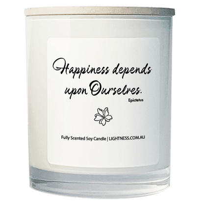 Candle in white glass jar with Happiness quote - Happiness depends upon ourselves.