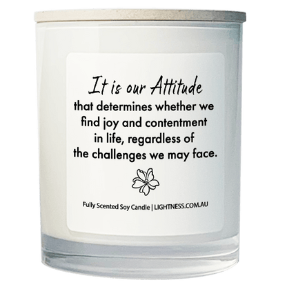 Candle in white glass jar with Happiness quote - It is our attitude that determines whether we find joy and contentment in life, regardless of the challenges we may face.