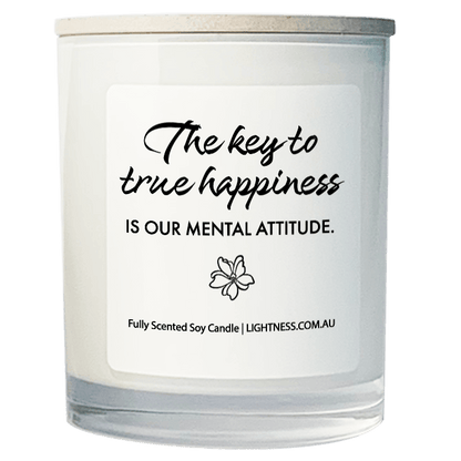 Candle in white glass jar with Happiness quote - The key to true happiness is our mental attitude.