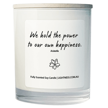 Candle in white glass jar with Happiness quote - We hold the power to our own happiness.