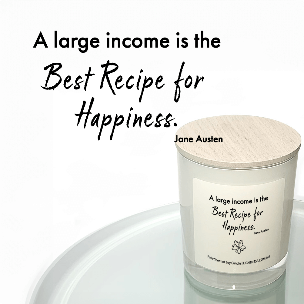 Candle in white glass jar reflected in mirror with Happiness quote - A large income is the best recipe for happiness.