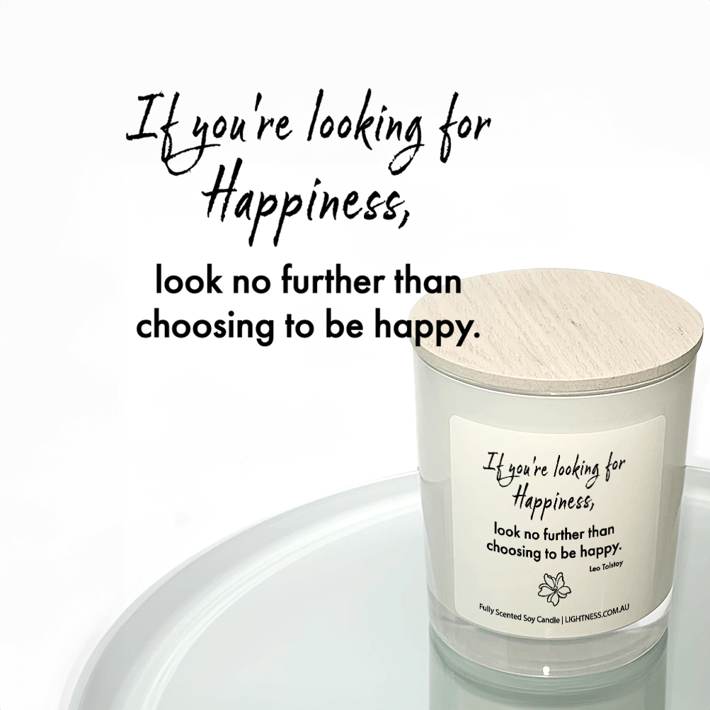 Candle in white glass jar reflected in mirror with Happiness quote - If you're looking for happiness, look no further than choosing to be happy.