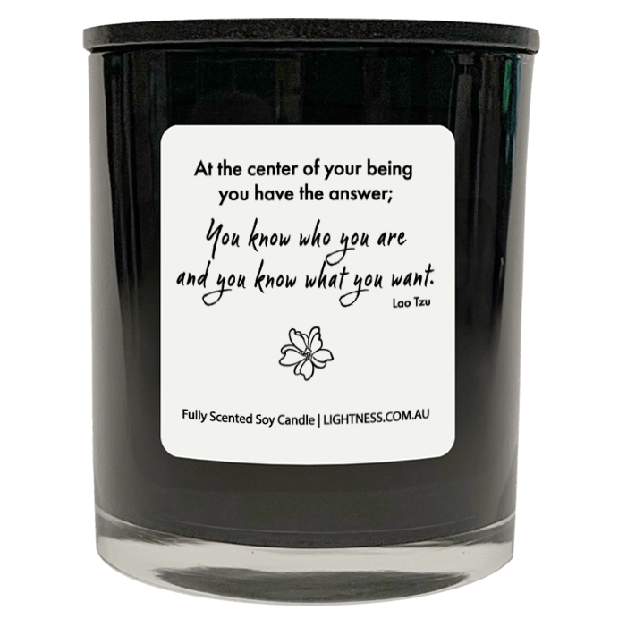 Candle in black glass jar with motivational quote - At the center of your being you have the answer; you know who you are and you know what you want.