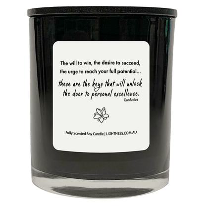 Candle in black glass jar with motivational quote - The will to win, the desire to succeed, the urge to reach your full potential... these are the keys that will unlock the door to personal excellence.