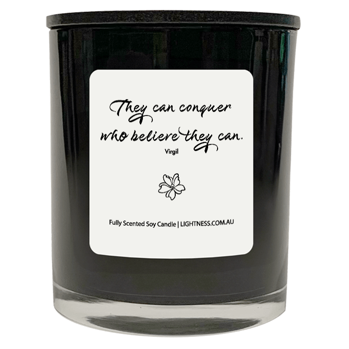 Candle in black glass jar with motivational quote - They can conquer who believe they can.