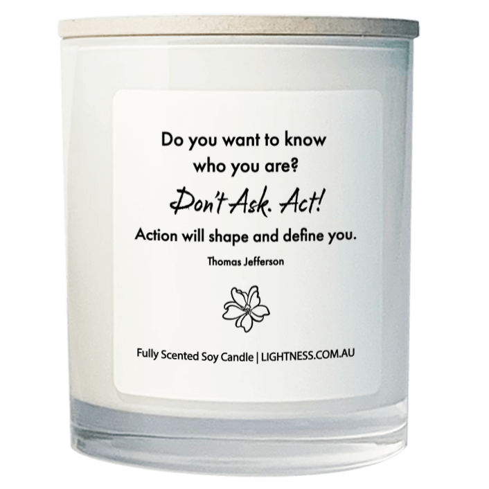 Candle in white glass jar with motivational quote - Do you want to know who you are Don't ask. Act Action will shape and define you.