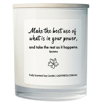 Candle in white glass jar with motivational quote - Make the best use of what is in your power, and take the rest as it happens.