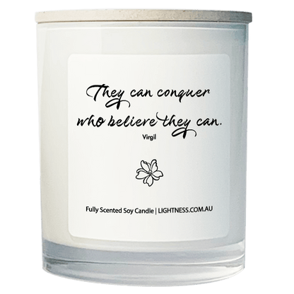 Candle in white glass jar with motivational quote - They can conquer who believe they can.