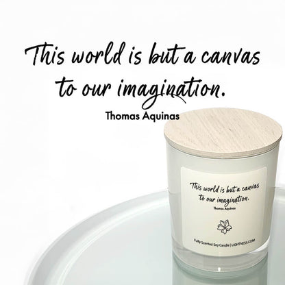 Candle in white glass jar reflected in mirror with motivational quote - This world is but a canvas to our imagination.