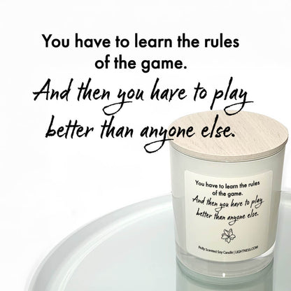 Candle from front and top with motivational quote - You have to learn the rules of the game. And then you have to play better than anyone else.