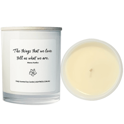 Candle from front and top view with motivational quote - The things that we love tell us what we are.